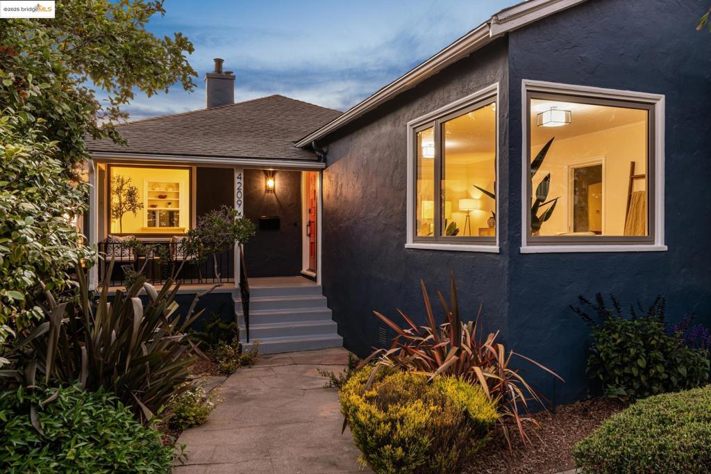 Perched on an expansive park-like lot spanning almost 9000SF, this home is your private slice of serenity in the hills, without living like you’re on a hill. The views alone are next level—look out over the hillside at the breathtaking bridge, the glittering lights of SF, & a horizon that shifts from a golden hour glow to a sparkling cityscape at night. Step into the oversized living room anchored by the beautiful fireplace, & immediately you’re greeted with a sense of space surrounded by natural light. The dining room offers you a place to entertain or relax & has a charming pass-through window to the kitchen. The updated kitchen includes a breakfast area with a built-in corner bench that’s the perfect spot for hanging out & provides even more storage. A favorite & rare delight is the bright sunroom off the kitchen. Silhouetted by views think family room, brunch spot, gaming HQ—you choose! With 3+ bedrooms & 2 bathrooms, plus a secret attic hideaway perfect for meditation, mischief, or movie marathons- the flow and floor plan offer something for everyone. Downstairs, you’ll find a large laundry zone that doubles as a utility room, craft space, or storage center. The outdoor space here is unmatched: a grassy lawn, BBQ area, play structure, quiet corners--this yard has it all it!