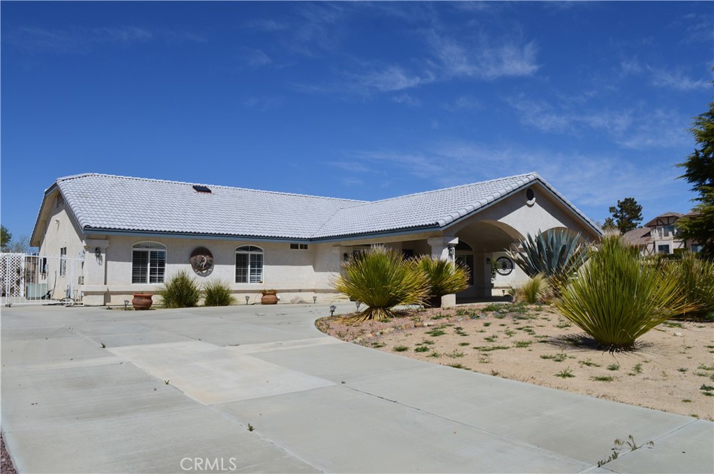 Beautiful home centrally located in Apple Valley! Conveniently located close to parks, schools, and shopping centers, supermarkets. Easy access to 15, freeway. This beautiful home features an open floor plan with formal living room, formal dining room, family room with fireplace and open to the kitchen. 4 Bedrooms and 3 bathrooms. A full bathroom/powder-room and individual laundry room. The spacious master bedroom has several large windows brings in warm natural light and has separate tub and shower, double sink vanity, a large walk-in closet. Huge backyard with a workshop and a shed and plenty of parking with RV parking. This home has some much more!