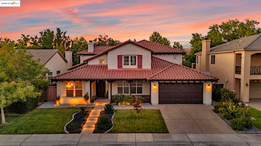 This stunning Smart Home showcases 3,747 sq ft of beautifully designed living space, featuring 4 spacious bedrooms and 3.5 baths. A large office easily serves as a 5th bedroom. With over $50,000 in upgrades, this pristine property is nestled in Natomas near shopping, just a short walk to the highly rated Natomas Charter School and under 10 minutes to the airport. Step inside to a warm, inviting ambiance, enhanced by fresh neutral paint, striking new chandeliers, and a sleek stainless steel oven/microwave combo. The kitchen delights with a farmhouse sink, large range, custom stained glass backsplash, and unique lighting. A main-level bedroom with full bath adds flexibility, while the primary suite offers a rain shower with Bluetooth lighting and music for a spa-like retreat. Additional highlights include travertine entry, hardwood floors throughout, and solar panels for efficiency. This home blends luxury with convenience—don’t miss your chance to own it!