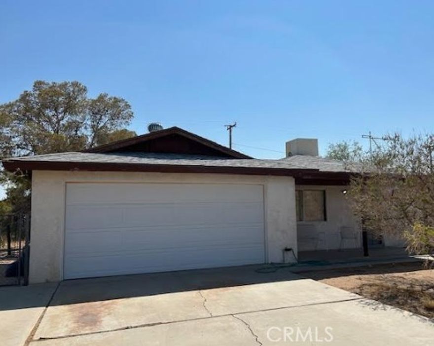 **PRICE REDUCED** Welcome to 1204 Mahan Street! Great family home located in Ridgecrest Heights with lots of potential offering a spacious 4 bedroom and 2 bathroom layout great for entertaining and the coveted two car garage. Large kitchen area opens to a family room/dining room with lots of natural light and a relaxing breeze. Fabulous laundry area with access to the backyard. The home sits in the middle of a large lot great for entertaining, bbq, and plenty of storage/parking. Very quiet and peaceful with neighbors situated away from the home. With a little TLC, this can be a fantastic home for years to come. The lot next door is also available for sale for added space and convenience.