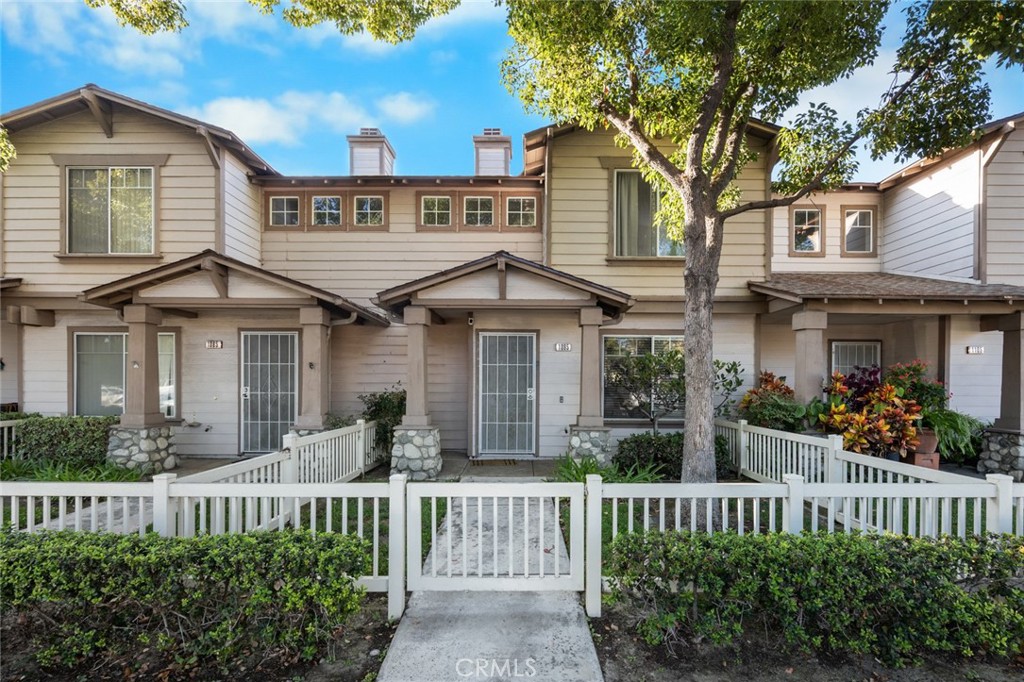 Welcome to 1095 E Broadway, Anaheim a well maintained 3 bedroom, 2 bathroom townhome located in a secure gated community near the Anaheim Packing District and Downtown Anaheim. Priced as one of the best values in the area, this home is perfect for first-time homebuyers seeking comfort, convenience, and space in a prime location. Inside, you'll find a bright, open layout with a spacious living area, functional kitchen, and generously sized bedrooms. Both bathrooms feature new tile upgrades, adding a fresh, modern touch. Step outside to enjoy a private courtyard and a surprisingly roomy yard rare for townhome living ideal for relaxing, entertaining, or gardening. The community HOA includes access to two parks, barbecue areas, and the security of a gated entrance. With easy access to local dining, shopping, and entertainment, plus the added peace of mind of a gated community, this is an opportunity you don’t want to miss.
