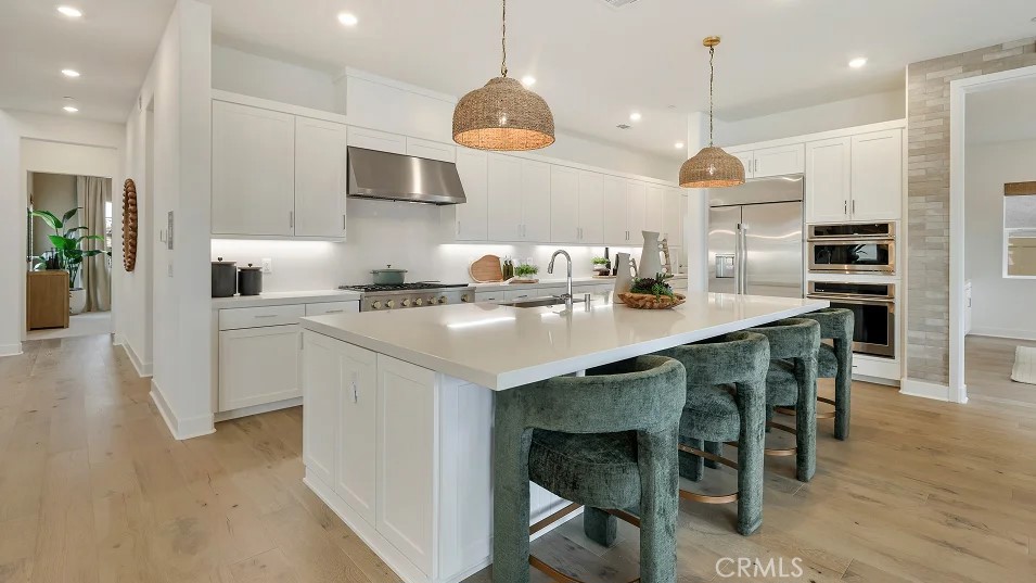 This expansive two-story home offers plenty of space with a total of 4 bedrooms with one of the bedrooms located downstairs with its own private bathroom. The first floor also offers a Den perfect for an office or gaming room. The rest of the first floor features an open layout from the modern kitchen that offers white cabinetry throughout, massive walk in pantry. The dining and family room opens to a covered California Room ideal for indoor-outdoor living. The second floor hosts a bonus room along with three more bedrooms all have their own private bathroom. The luxe owner's suite a retreat with a large walk in closet. upgraded flooring through out.