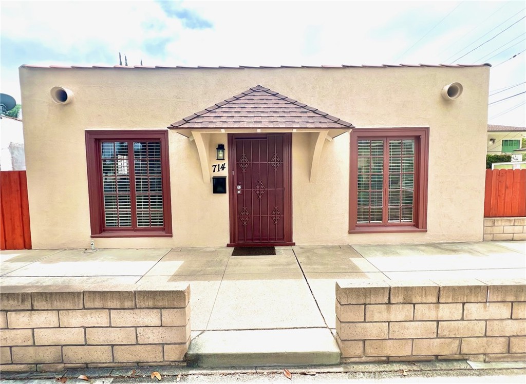 Charming vintage home, 2 bedroom, 1 bath plus a detached studio zoned as an art studio with full kitchen and full bath. Front house is approx 900 sq ft and art studio is about 350 sq ft. This property has so many possibilities! Located just near the junior college in a commercial zone with residential zoning grandfathered in. Buyers will need to verify with the city of Fullerton regarding zoning and possible usage.