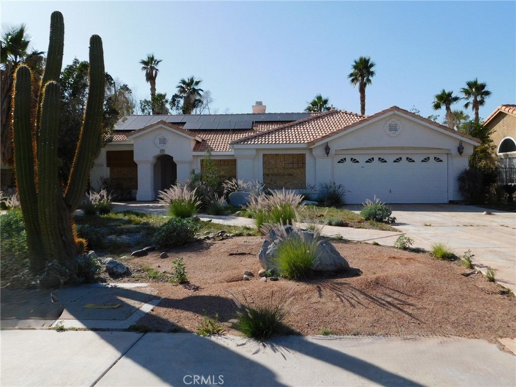 Photo of 9651 Cholla Dr, Desert Hot Springs, CA 92240 (MLS # JT26056180)
