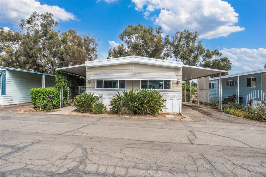 Welcome to this well maintained mobile home located in a desirable family park! This home features 2 spacious bedrooms and 2 full bathrooms, offering comfort and functionality. The kitchen comes fully equipped with a refrigerator ,stove ,microwave, and dishwasher, while a washer and dryer are also included for added convenience. Enjoy community living with access to great amenities, including swimming pool and clubhouse. A wonderful opportunity for anyone looking for affordable living.