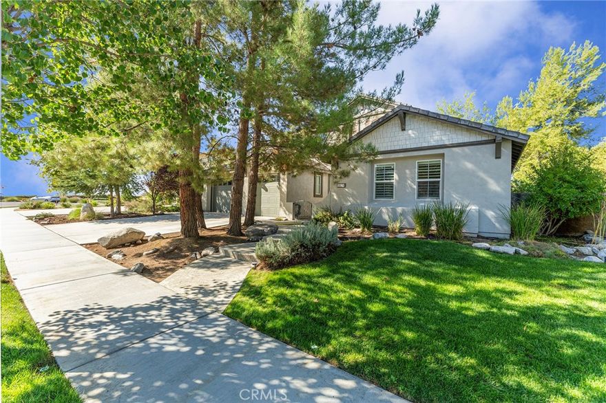 Beautiful Luxury home, sits on a quaint cul de sac with amazing evening views! Mature trees, above ground spa and 16' Swim Spa with back yard fire pit--great for entertaining.  Granite countered kitchen area has all the amenities and storage for a family feast, new dishwasher, LG refrigerator and Jenn Air stove top and double oven.  Primary bedroom downstairs, with sitting area/reading nook with fireplace, kitchenette and french doors to outdoor covered area-- Perfect for breakfast coffee, reading, meditation area, etc. double walk in closets, two sinks in oversized bathroom with an inviting Roman jacuzzi tub.  Shutters on all windows.

4 Upstair bedrooms have been divided to create 2 suites- so many opportunities, each suite has a full bath with 2 bedrooms--teenage/grown children, college age children, guests and/or nannies or maids, etc.  

Upstairs deck makes use of the amazing views of the valley below, with exterior access to upstairs guest bedroom...extra-large back yard.  Surround sound sytem in living, family and outdoor area. Built in bookcases in living room and newer flooring throughout this expansive open floor plan for multi generational living.  3 AC units--primary bedroom has their own unit,  another for upstairs and one for downstairs.

Mature fruit trees and planter boxes-Clementine, pomegranite, stawberries and carrots.  Home pre wired for swimming pool.  Community boasts 30 miles of hiking trails near a regional park, while only 1/2 mile to local shopping.  The list of amenities goes on and on.

Buyer to assume Solar Lease.