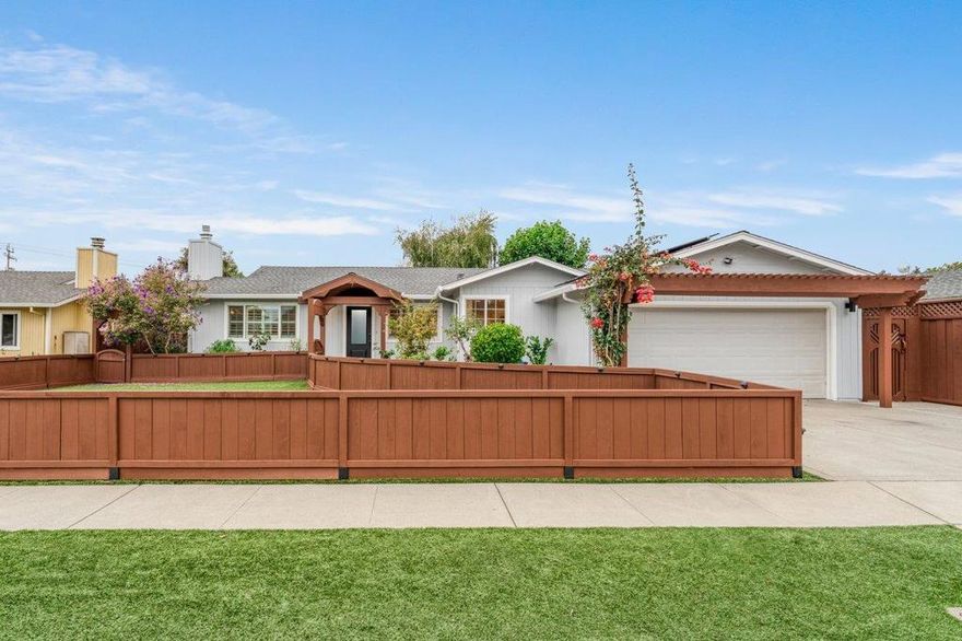 Discover the charm of coastal living at 2257 Juan Pablo Lane in Santa Cruz! This inviting 3-bedroom, 2-bathroom home spans 1,514 square feet and offers a delightful blend of comfort and style. With fresh paint inside and out, this home shines with modern updates, including new luxury vinyl plank flooring, updated hardware and lighting throughout, and the benefit of owned solar for energy efficiency.   The spacious living area features a cozy fireplace, perfect for unwinding after beach adventures. The kitchen is designed for both functionality and style, while the energy-efficient dual-pane windows bring in plenty of natural light. Step outside to your private oasis with drought-tolerant landscaping, artificial turf, and a drip irrigation system, making for easy maintenance. Unwind in the backyard hot tub, a serene retreat after work or time at the beach.  Situated on a 6,142 square foot lot, this home is ideally located near Chanticleer Park, with easy access to the beach and the charming coffee shops nearby. Enjoy the blend of a serene setting with all the amenities you desire. Don't miss the chance to make this delightful home yours!