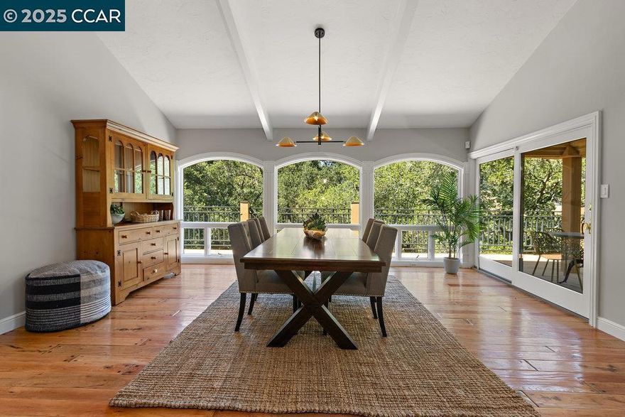 Welcome to your own private oasis, tucked behind a secure gate on a serene 1.32-acre hillside parcel.This extraordinary estate blends elegant architecture, thoughtful design, and breathtaking natural surroundings to create a resort-style retreat you’ll call home. A concrete driveway guides you past lush surroundings to an upper patio and expansive outdoor entertaining space.The main level features an open-concept great room with soaring ceilings and walls of windows that showcase breathtaking hillside views. One of the two resort-style primary suites is conveniently located on the first floor, perfect for in-law and guests.The chef’s kitchen boasts a dramatic design with an oversized granite island, high-end appliances and abundant counter space. The lower level features two additional primary suites, along with a generously sized bonus room that serves as a flexible recreation space. Multiple decks surround the home and are accessible from nearly every interior room, offering seamless indoor-outdoor living. A beautifully landscaped backyard with towering trees that provide shade on warm summer days, a built-in BBQ, and a sparkling pool and spa—perfect for entertaining. This home is the epitome of relaxed luxury, where comfort, style, and privacy come together in perfect harmony.