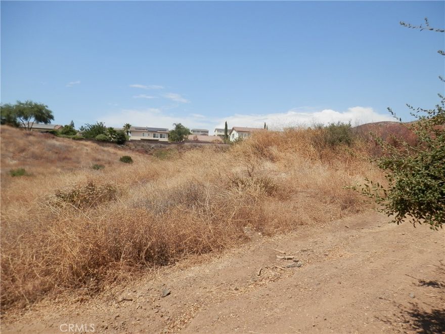 Exciting new listing! Offering a collection of 3 contiguous lots in the growing city of Wildomar, in Riverside County. Located north of the 15 Freeway and Cottonwood Acacia St., Power is nearby the topography varies from flat to gently rolling, offering scenic views and flexible development potential. Short drive to I-15, I-215, and Hwy 74, Proximity to Loma Linda University Medical Center, Mt. San Jacinto College, shopping centers, and schools. Located near Canyon Lake, Menifee, and Lake Elsinore. Whether you’re looking to develop one home or invest in multiple parcels, this is an excellent opportunity in one of Southern California’s fastest-growing regions. Enjoy privacy, convenience, and beautiful surroundings, not quite off the grid, but close to nature. Buyer to verify land use and development potential with the City of Wildomar Planning Department. APN: 361-051-012; 361-051-013; 361-051-014. Size: +/- 26,000 S.F; Zoning: RR; Terrain: Flat to rolling; GPS: 33.655529, -117.234124 (N.E Corner)