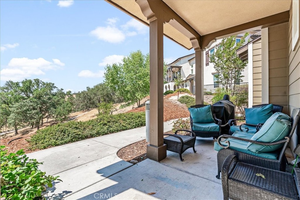 Discover this beautifully designed 2,070 square foot home in the gated Woodridge Community of South Atascadero. This 4-bedroom, 3-bathroom residence at 9361 Ranada Drive features an open floor plan with a spacious great room, modern kitchen with center island, and seamless flow to the dining and living areas. The main floor bedroom/office/den is open to the entry and privacy can be added with the addition of a door. It has an adjacent bathroom for added convenience. Upstairs, you'll find three well-appointed bedrooms including a generously sized primary suite with luxurious ensuite bath, walk-in closet, vaulted ceilings and a versatile loft above perfect for fitness, business, or relaxation. The two additional upstairs bedrooms share a thoughtfully designed bathroom with double vanities, while a dedicated laundry room with built-in storage cabinets and utility sink complete the upper level. Additional features include an attached 2-car garage, a covered seating area that is located off the front entrance with stunning oak-studded views and direct access to Las Lomas trails. This move-in ready home offers the rare combination of gated community living, natural surroundings, and modern amenities in one of South Atascadero's most sought-after neighborhoods. Call your agent today to schedule a showing. Information deemed reliable but not guaranteed.