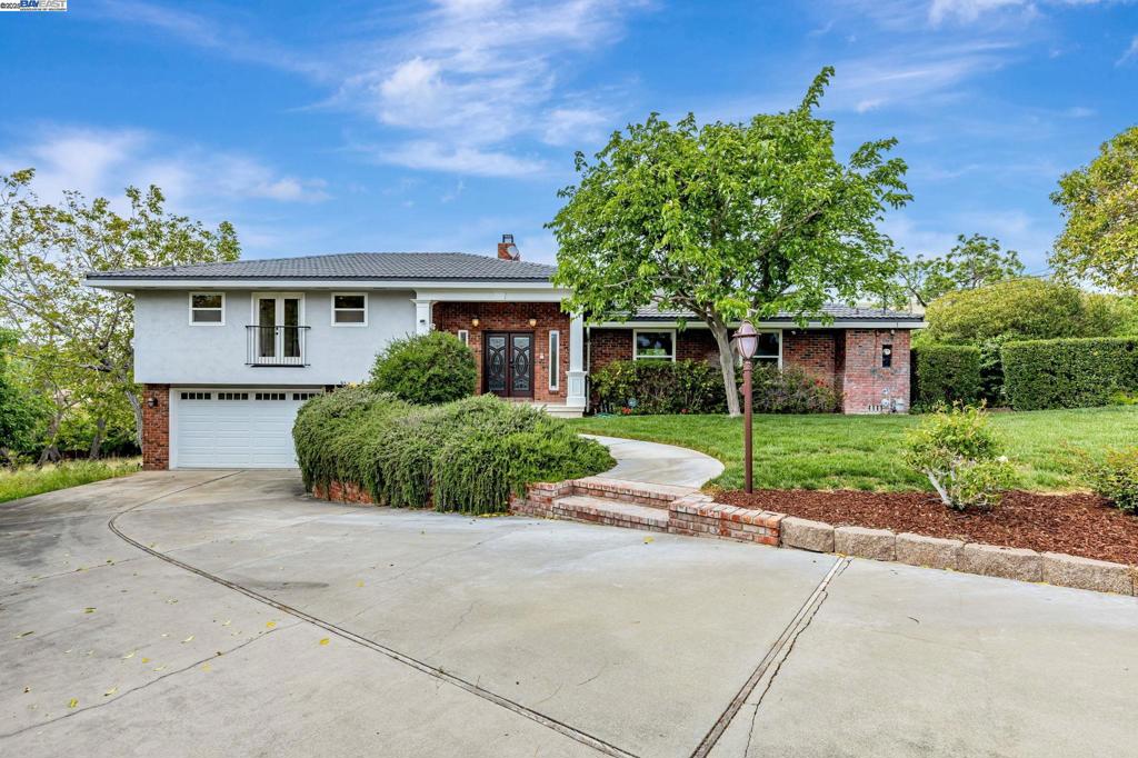 Exceptional estate/investment opportunity in Concord's Clayton Valley Highlands! This fully remodeled 4-bedroom, 2 full bath, 2 half bath home sits on nearly 2 acres, offering both comfort and potential. Features include a gourmet kitchen with granite countertops and stainless steel appliances, updated bathrooms, hardwood floors, double-pane windows, and a versatile lower-level bonus room with backyard access. Preliminary subdivision plans for three lots have been submitted and reviewed by the city, and a land survey has been completed. Ideal for families seeking space or investors exploring development possibilities.
