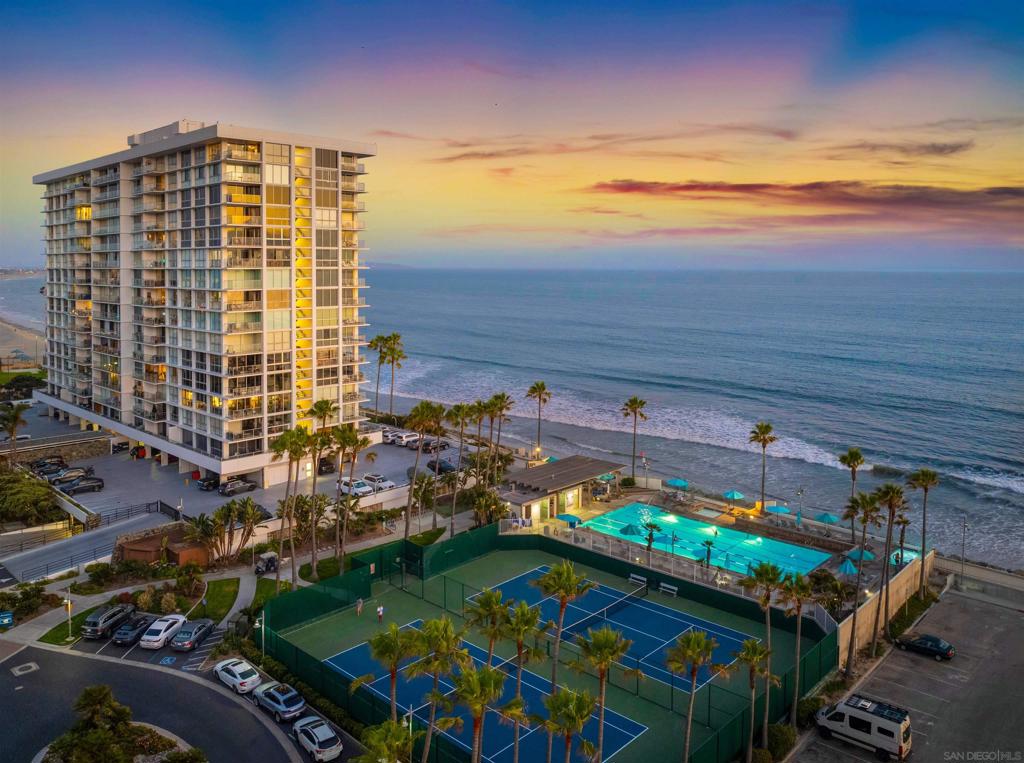 Don’t miss this rare opportunity to own a stunning 11th-floor view condo in the prestigious El Camino Tower at Coronado Shores! This beautifully positioned residence offers sweeping, unobstructed views of the bay, marina, downtown San Diego skyline, Coronado Bridge, and the Pacific Ocean—visible from your living room balcony. Mere feet from the beach, this home delivers the best of coastal luxury living. Perched within one of ten luxurious towers that make up the Coronado Shores community, this condo enjoys access to an unmatched array of resort-style amenities. Residents benefit from 24-hour doorperson service, along with meticulously maintained common areas, recreational facilities, and amenities managed by the L&R Committee, which acts as an unincorporated master association. Each tower is individually incorporated and governed by its own condominium association, offering both autonomy and shared luxury. Live amidst the elegance and ambiance of an oceanfront resort with features that include tennis & pickleball courts, multiple swimming and therapy pools, a fully equipped spa and fitness center, a private beach club, and the Roeder Pavilion—available for private events. The Beach Clubhouse hosts a bar, live entertainment, and dances, creating a vibrant social atmosphere year-round. This iconic community fronts the Pacific Ocean and is adjacent to the world-famous Hotel del Coronado, with panoramic views extending from the Vallecitos Mountains to Point Loma, downtown San Diego, San Diego Bay, and the charming City of Coronado. Enjoy a close proximity to the Coronado Yacht Club, Marina, and the scenic Coronado Municipal 18-hole Golf Course—just three minutes away. Explore the unique shops and restaurants of the Coronado Village, or take a quick drive—10 minutes to downtown San Diego, 15 minutes to the airport, and 20 minutes to Mexico. Live the Coronado lifestyle—where luxury, location, and breathtaking views come together in perfect harmony.