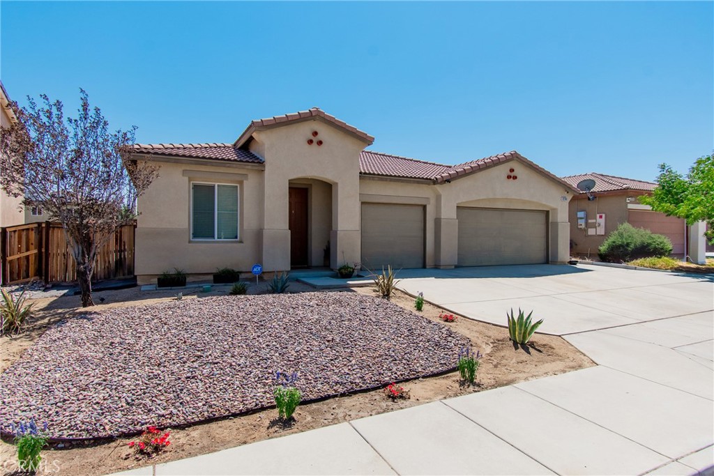 Welcome to 12763 Mesa View Drive! Located in the desirable, family friendly community of Eagle Ranch. This spacious one story is the perfect blend of form and function, upon entering you are greeted with beautiful Linoleum Vinyl Plank floors that continue into the kitchen with a generous size island, granite countertops, Stainless Steel appliances and wood cabinetry open to the dining area and great size family room allowing open concept living. The family room offers large sliding doors that lead you to the very large backyard with concrete patio and open canvas just waiting for you to create your paradise backyard. The large Master bedroom has a walk in closet with an en-suite bathroom, dual sinks and separate shower and tub. Guest bathroom has a combo shower/tub with Linoleum floors. Indoor laundry room with a door that leads to the expansive 3 car garage. This home includes solar to help you live more sustainably, allowing energy efficiency and savings. Located just minutes away from restaurants, gas and shopping at the Victor Valley Mall. Commuters will appreciate easy access to the 395 and 15 freeway.