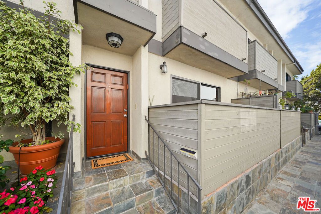 Photo of 11952 Darlington Avenue #3, Los Angeles, CA 90049 (MLS # 26655561)