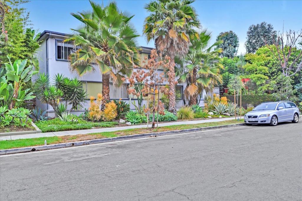 Enjoy the best of Santa Monica lifestyle in this fantastic top-floor home! This front-facing corner bright home features treetop views, an open living/dining floor plan finished in grey oak, and high ceilings with sleek recessed lighting. Gorgeous G-shaped kitchen with stylish subway backsplash, quartz countertops, stainless steel appliances, and generous cobalt blue cabinetry. Concealed washer and dryer also installed to make chores a breeze. Elegant bathrooms with floor-to-ceiling luxury tiling and gorgeous vanities for pampering! Good-sized bedrooms with spacious custom closets, ready to give a great night's rest. The primary bathroom comes with a beautiful half bath, perfect for privacy. Your new home is in a secure, gated community that puts you close to the best of Santa Monica! Walkable to Downtown, with tons of restaurants, shops, errands, public transportation, and entertainment. Few minutes to the beach! Pets - Cats Only Pet Deposit - $500