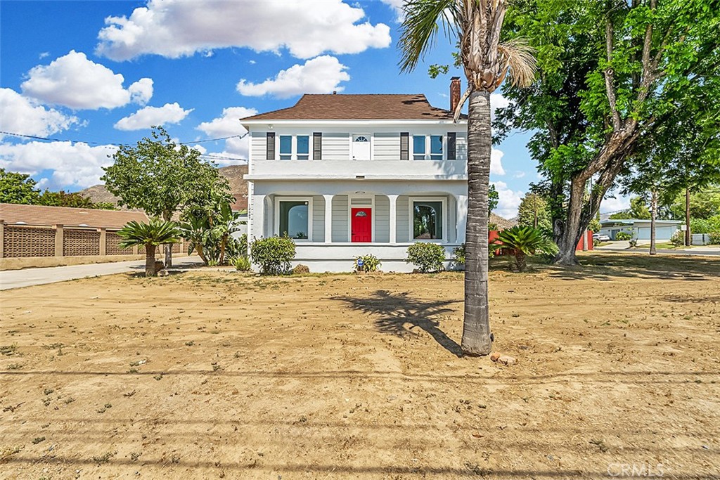 Fully Remodeled 1901 Colonial architecture home on Expansive Corner Lot in Grand Terrace!
This rare and beautifully updated two-story home blends historic charm with modern living. Built in 1901, this 4-bedroom, 2-bathroom home offers 2,128 sq ft of living space and sits on a massive 24,480 sq ft corner lot in the heart of Grand Terrace, CA. Completely remodeled from top to bottom, the home features updated electrical, plumbing, and tankless water heater providing comfort and peace of mind without sacrificing character. The spacious interior boasts a functional layout with large living areas, upgraded finishes, and natural light throughout. Step outside and enjoy your own private swimming pool, perfect for summer gatherings. A long driveway leads to a detached garage located at the rear of the property—ideal for additional parking, storage, or future ADU potential. With its huge lot, prime location, and seamless blend of history and modern upgrades, this unique home offers space, style, and flexibility rarely found on the market today.