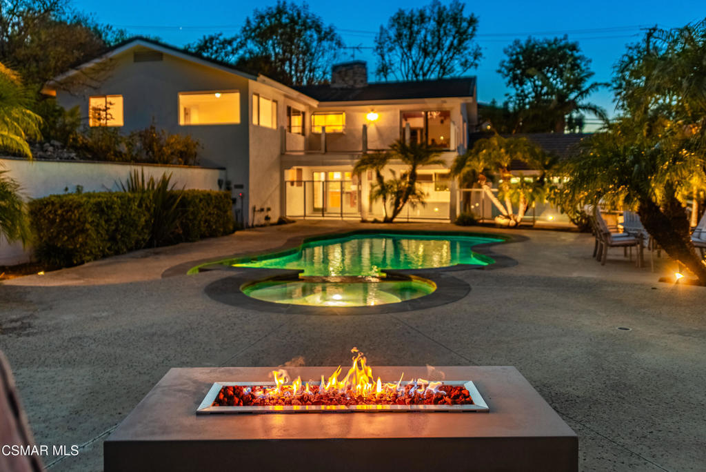 Stunning 5-bedroom home with amazing panoramic city views & equestrian potential nestled in the scenic Palos Verdes Peninsula. This exceptional home offers 5-bedrooms, 3-bathrooms in 2742 sq. ft. of luxurious living space, perfect for families and entertainers alike. The open floor plan, granite countertops, and central AC create a seamless blend of elegance and comfort, while breathtaking city views provide a picturesque backdrop from nearly every room. Step outside to your private oasis, where multiple decks and patios offer the perfect setting for outdoor gatherings. Enjoy sunny afternoons by the sparkling pool and jacuzzi. Evenings can be spent sitting by the fire pit and taking in the city lights and sounds of the canyon nightlife. It is a breeze to unwind in the tranquility of this peaceful neighborhood, where peacocks roam freely. Designed for both everyday living and special occasions, the spacious layout flows effortlessly, making this home an entertainer's dream. For equestrian enthusiasts, the property provides ample space for a stable, trailers, and all your horse-related needs, with easy access to nearby hiking and riding trails. The circular driveway and the potential RV access area ensures plenty of parking for guests, while the charming wood fencing adds privacy and character to the stunning surroundings. This home was taken down to the studs and updated in 2001. Don't miss this rare opportunity to own a one-of-a-kind property in a highly sought-after location. Schedule your private showing today!