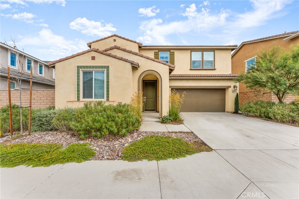Built just 3 years ago and better than new, this beautifully upgraded Redlands home offers 4 bedrooms, 3 bathrooms, and a versatile layout. Downstairs includes a bedroom and full bath—perfect for guests or multi-generational living—plus a flexible bonus room ideal for a home office, gym, or potential 5th bedroom. The open-concept living area and kitchen are filled with natural light from numerous windows, all adorned with custom designer Roman shades, found throughout the entire home. Upstairs, you’ll find a generous loft, two secondary bedrooms, a full bath, and a convenient laundry room. The expansive primary suite features two walk-in closets and an ensuite bath with a soaking tub, walk-in shower, and dual-sink vanity. Enjoy low-maintenance outdoor living in the fully hardscaped backyard, complete with artificial turf, pavers, and extended concrete. Additional upgrades include PAID-OFF SOLAR, stunning engineered hardwood flooring, and a two-car garage outfitted with custom Swisstrax flooring tiles. Located within the top-rated Redlands Unified School District, residents also have access to a community park, playground, and picnic area. Just minutes from Citrus and Mountain Grove Shopping Centers and close to the 10 and 210 freeways for easy commuting. This home checks every box—schedule your private showing today!