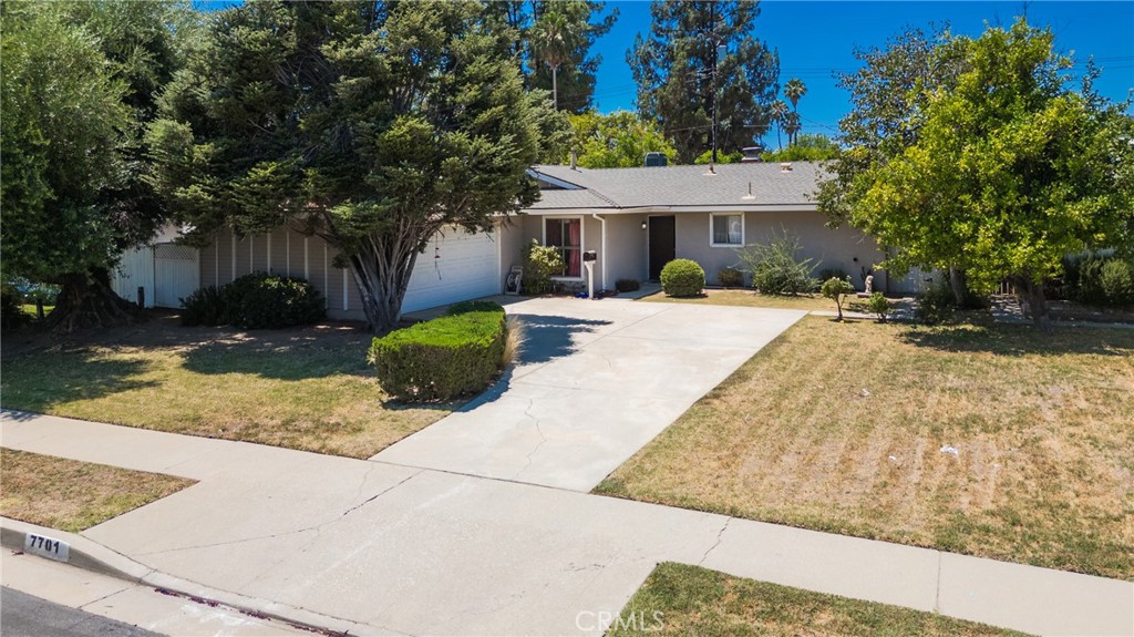 This is a traditional, one-story 3 bedroom, 1.75 bath home with central refrigerated air conditioning and forced air heat, a wood-burning fireplace and true formal dining room that could become a 4th bedroom. This quiet neighborhood is conveniently located near schools, shopping, local businesses and restaurants as well as the Warner Center, with all of the new improvements and development there that is underway. There is also a double attached garage with side by side parking in addition to the driveway that will park several cars, and a good-sized backyard just beyond the enclosed patio. The home has 1,303 square feet and sits on a 7,528 square foot lot. Come take a look!