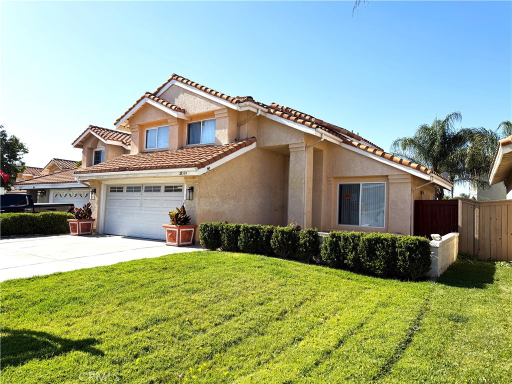 Located in the desirable "Brigata On The Lake" community within Menifee Lakes. This home features 3 bedrooms, 2.5 bathrooms, and a 2-car garage. High Power 33 SOLAR PANEL system delivering exceptional energy efficiency with almost ZERO Electric Bills and monthly savings comes with this home. This beautifully upgraded home features brand new Quartz Countertops in the kitchen and granite countertops in all bathrooms. Enjoy a spacious front porch, a rare find in this Menifee Lake community. The property offers new window coverings and blinds, upgraded cabinetry in the kitchen and throughout the home, and recessed lighting for a modern touch. Additional highlights include a whole-house fan for energy efficiency, a fully finished garage. As you enter, you're welcomed by a bright and open formal living and dining area highlighted by high cathedral ceilings, creating a warm and inviting atmosphere. The cozy family room, complete with a fireplace, offers the perfect spot for relaxation or entertaining. The well-appointed kitchen provides ample cabinetry and counter space to inspire your inner chef. Step outside to a private, low-maintenance backyard with fruit trees, ideal for outdoor dining, entertaining, or unwinding in your own peaceful backyard. 220V EV Plug in-Garage. Menifee Lakes offers residents a host of resort-style amenities, including a scenic lake with paddle boating and catch-and-release fishing, a beach-style pool, multiple parks, and walking and biking trails that weave throughout the community. Golf enthusiasts will love being near the Menifee Lakes Country Club, known for its beautifully manicured fairways and courses that cater to all skill levels. Conveniently located, this home offers easy access to the 215 Freeway and is close to Bell Mountain Middle School, Mt. San Jacinto College, the new Menifee Library, and Menifee Town Center Shopping Center. It’s just 6 miles from the new Murrieta Costco and only 17 miles from Temecula’s world-renowned wineries and Pechanga Resort & Casino. Menifee is one of California’s fastest-growing cities, offering a unique blend of suburban serenity and modern convenience. Schedule your private tour today! Option for RENT-TO-OWN. Contact for more details.