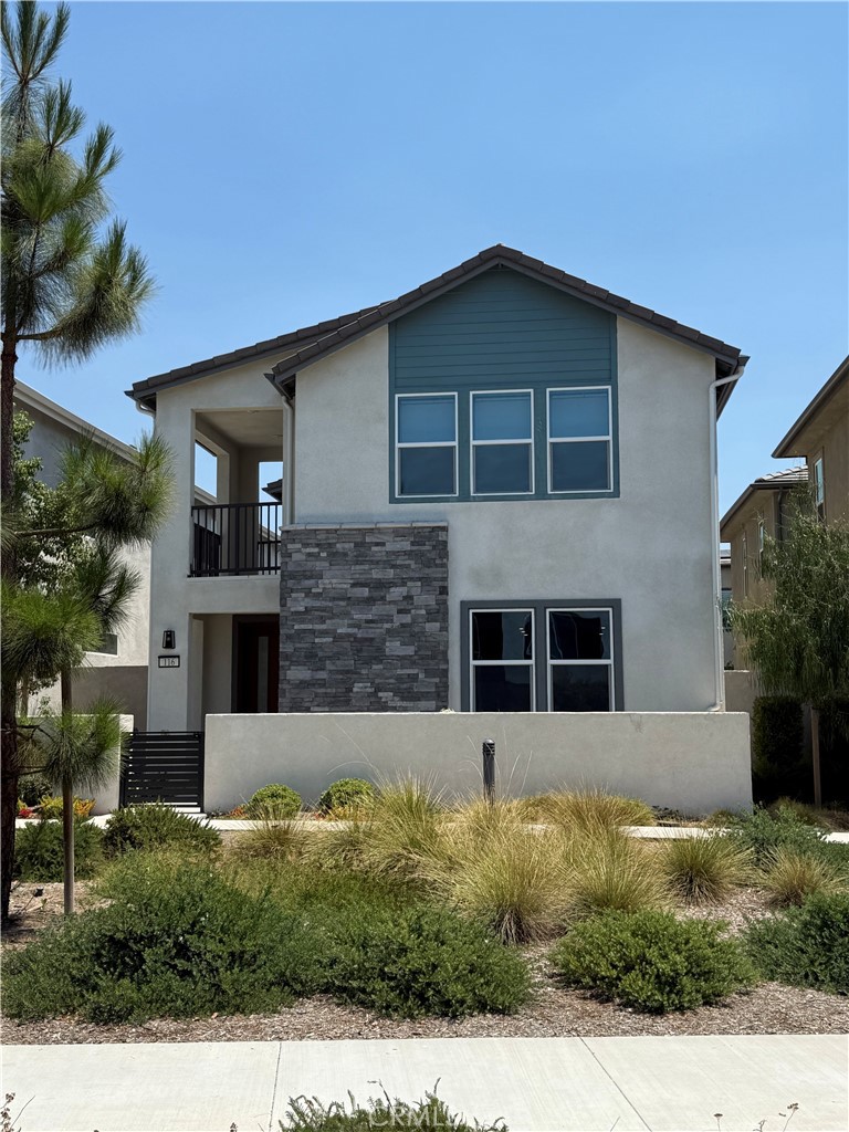 First showing is 8/23 at open house this weekend. Welcome 116 Zawn, this stunning 2022-built 2,311 sq. ft. detached home, perfectly situated in the highly sought-after Solis Park neighborhood within Irvine’s prestigious Great Park community. Featuring the community’s most popular floor plan, this south-facing residence is filled with abundant natural light and showcases a seamless open-concept design, ideal for modern living.
The first floor boasts a spacious layout highlighted by a gourmet kitchen with white cabinetry, thick quartz countertops, stainless steel appliances, and a built-in refrigerator. Ample storage can be found both inside the home and in the garage.
Upstairs, the luxurious owner’s suite offers a spa-like bathroom, while the standard loft provides a versatile space perfect for a home office or children’s play area.
This exceptional home is located just steps from Solis Park’s “The Retreat” — a resort-style amenity featuring a sparkling pool, spa, outdoor gathering spaces, high-end BBQ stations, and elegant fire pits. Directly facing Solis Park K–8 School and only a five-minute walk to Portola High School, this location offers unmatched convenience for families.
Experience the best of Great Park living in this beautifully appointed home — a true must-see!