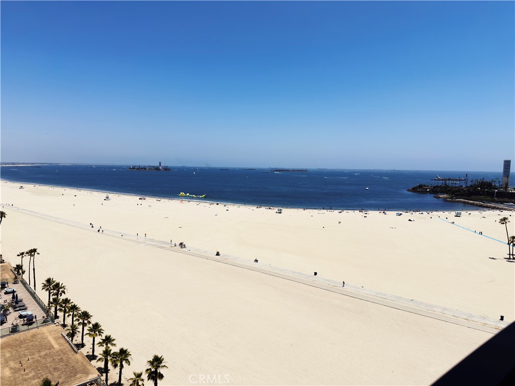 The Pacific - Luxury Condo in Alamitos Beach!
Wake up to panoramic oceans views from every window in this stunning 2 bedroom, 2 bathroom condo proudly on the 10th floor in the 04 block of The Pacific-Long Beach's premier beachfront high-rise. Located in vibrant Alamitos Beach, this residence offers the ultimate Southern California lifestyle with direct beach access and an unbeatable walkable location.
Inside, you will find bright, open living spaces illuminated in natural light and stunning views of the Pacific Ocean. Plenty of space to live comfortably and entertain in this jewel of a home. Step outside your front door to an impressive list of resort-style amenities, including a heated pool and spa, beachfront fire pit with barbecue, a fitness center, sauna, beach-level clubhouse, and library/billiards room.
The Pacific is a secure, full-service building offering 24-hour front desk attendants, management on site, and two assigned parking spaces. The luxury doesn't stop at the property line.
This is true coastal living-steps from Marina Green Park, Shoreline Village, the Long Beach Convention Center, and a wide array of restaurants, cafes, and boutiques. The area is alive year-round with festivals, art events, and outdoor concerts, and occasionally hosts professional sporting events! With excellent public transportation and everything you need within walking distance, you're perfectly positioned to enjoy all the culture, energy, and beauty Long Beach has to offer.
Whether you're seeking a serene oceanfront retreat or a home in the heart of the action-this is the one.