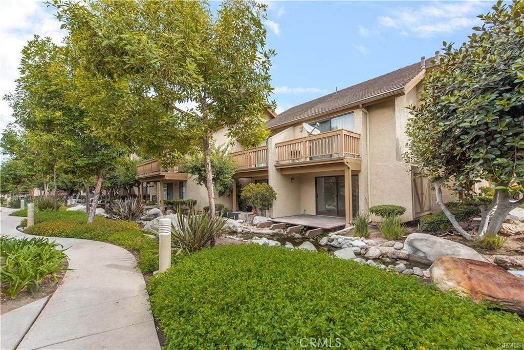 Quiet, ground floor, end unit one (1) bedroom condo with private deck overlooking stream. Close to Irvine Valley College
Features include:
* U-shaped kitchen with granite counter tops, breakfast bar, white cabinetry and white finished appliances (microwave & refrigerator included AS IS), recessed lighting and tile flooring.
* Bright living room with gorgeous bamboo wood flooring, recessed lights, sliding glass door to private deck and lots of natural light (south facing unit).
* Master bedroom features ceiling fan and upgraded en-suite bathroom with granite countertops and new light fixture, separate shower area and walk-in closet.
* CENTRAL AIR CONDITIONING.
* Inside stacked washer & dryer (included AS-IS)
* Private, partially covered wood deck adjacent to relaxing community stream. Note: There is NO fence on deck.
* Tenant responsible for electricity. HOA pays for water & trash.
* One (1) covered carport and abundant community / street parking.
* Community pool, spa, playgrounds, tennis, basketball courts, barbecues, picnic tables, clubhouses and immaculately manicured grounds.
* Close to award winning schools, shopping, entertainment, Irvine Valley College (IVC), the Spectrum, Irvine's Great Park and major freeways and toll roads.
Small dog may be considered with exceptional credit and financials with pet addendum and pet rent.