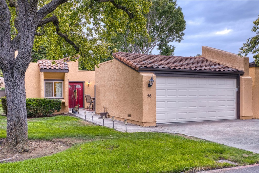 Located within the desirable Los Verdes Park I community, this 2-bedroom, 2-bath home offers 1,002 sq ft of comfortable living space surrounded by lush greenbelts and walking paths. The living room features a cozy fireplace, vaulted ceiling, and windows that frame peaceful greenbelt views, flowing seamlessly into the dining area and well-appointed kitchen. The primary suite includes an en-suite bath and serene views of the trees and greenbelt, while a second bedroom and hall bath provide space for guests or a home office. The attached 2-car garage offers ample parking, storage, and a convenient laundry area. Community amenities include a sparkling pool, indoor spa, sauna, sport courts, gym, and beautifully manicured grounds with mature trees, shrubs, and meandering walking paths. Ideally located near shopping and transportation, and just a short drive to the vibrant heart of downtown San Luis Obispo.