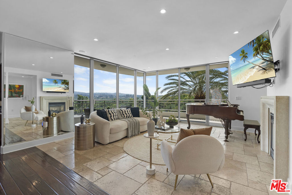 Situated in the prestigious 8049 building of The Plaza-Irvine, this sleek and modern luxury residence is one of the community's most coveted south-facing corner units. Its prime position within the complex showcases dramatic floor-to-ceiling windows that bathe the interiors in natural light and welcome refreshing coastal breezes all day long. The coveted corner layout captures sweeping, unobstructed views of both the serene nature preserve and the vibrant city skylinevisible from the living and dining areas, the primary suite, and the guest bedroom. Offering an exceptional blend of privacy, stunning scenery, and sophisticated design, this home delivers an elevated living experience in one of Irvine's most exclusive addresses.