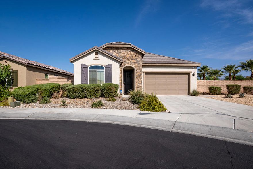 Welcome to 42897 Cusino Ct, a stunning desert retreat tucked at the end of a quiet cul-de-sac on an oversized 12,000 sq. ft. lot in a desirable 55+ community. This spacious home offers two living rooms and a versatile flex space that can serve as a bedroom, office, or hobby room. The kitchen is designed with both style and function in mind, featuring granite countertops, a central island with bar seating, and an open flow to the dining and living areas--ideal for entertaining. The primary suite is a private retreat with a walk-in closet, double vanity, soaking tub, and walk-in shower. Outdoor living is unmatched with two covered patios, custom misting systems, turf landscaping, and a resort-style custom pool with overflow spa, all framed by sweeping north and west-facing views that capture the desert sky and sunsets. A convenient laundry room with utility sink completes the home, which is offered fully furnished and move-in ready for your next desert chapter.Additional information: Seller states that an assumable VA loan may be available with an approximate balance of $217,000 at a 2.75% interest rate. Buyers are advised to verify eligibility and terms directly with the lender.