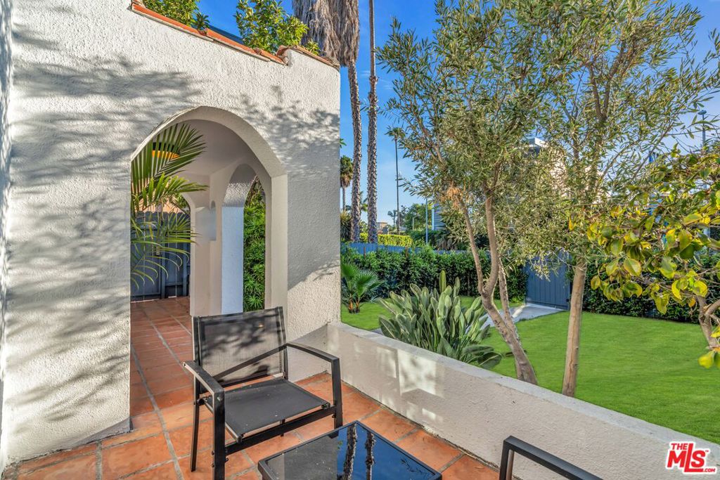 This updated Spanish Colonial gem in West Hollywood is gated for your privacy and features a lush front yard with natural grass and a turf backyard perfect for entertaining. Enjoy a firepit, grill, wet bar, splash pool, and outdoor shower with hot water. The delightful scents of grapefruit, lemon, and orange trees will surround you with natural bliss. The main house has 3 bedrooms and 2 bathrooms, plus a guesthouse/poolhouse that can serve as an office, fitness room, rec room, or additional living space. Complete with central air, washer/dryer, stainless steel appliances in a spacious kitchen, living room, and formal dining room. Whether you're seeking a fun family home, a shared space with friends or coworkers, or your own private oasis, this property is perfect for every need. Plus, it's conveniently located near several bars, cafes, restaurants, and markets that WeHo has to offer! 2 Tandem parking spots in the driveway. One year minimum lease required unless you are a victim of the recent wildfires, as per West Hollywood regulations.