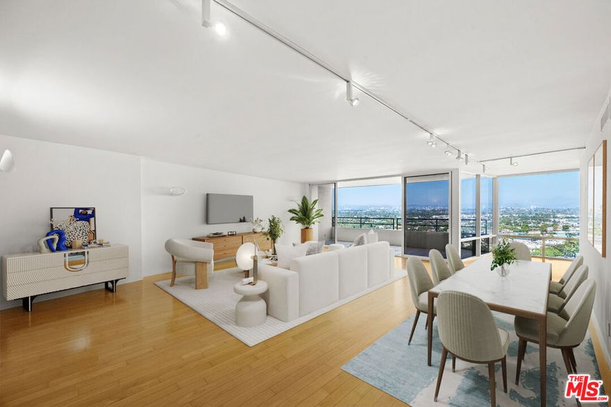 Stunning urban resort condo in Marina del Rey Harbor! Upon entering, you are greeted with spectacular city, hill, and distant mountain views, abundant natural light, and an airy ocean breeze. This beautifully remodeled three-bedroom, two-bath home by renowned architect Ted Tokio Tanaka, FAIA, features an open-concept floor plan with maple floors throughout, floor-to-ceiling windows, and granite flooring in the entry. A freshly painted, expansive living room with access to a large balcony is ideal for relaxation and entertaining. The kitchen includes ample cabinetry, Bosch dishwasher and refrigerator, LG built-in microwave, and GE oven/range. The primary bedroom, overlooking Oxford Basin, offers a remodeled bathroom with glass windows to enjoy the views. Both bathrooms feature custom sinks and vanities, each with a heated INAX washlet seat and bidet. This desirable end unit is situated on the 10th floor, which is effectively the 15th floor due to the four-level parking structure beneath, in the Center Tower with direct access to the Fitness Center and Restaurant. Two side-by-side parking spaces are conveniently located on the street level near the elevator. Marina City Club offers resort-style living with 24-hour security, a Fitness Club with sauna, jacuzzi, and steam room, three pools, six tennis courts, racquetball and paddle tennis courts. On-site amenities also include a fine dining restaurant, room service, beauty salon, dry cleaning, and car wash services. Just moments away from Marina del Rey's Mother's Beach, the famous Abbot Kinney, Venice Canals, and an array of restaurants and shops. Conveniently close to the 90 and 405 freeways, and less than 30 minutes from LAX International Airport. Your dream Marina lifestyle awaits!