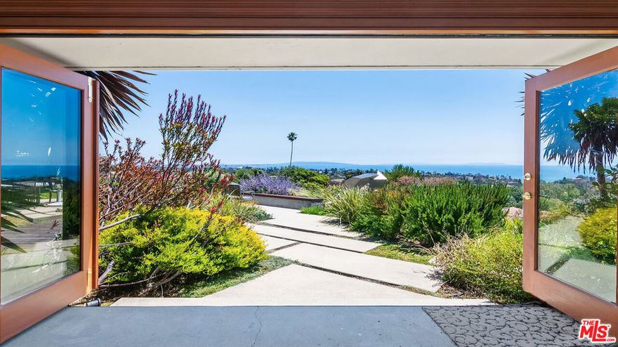 Views you have only dreamed of! Breathtaking panoramic views of Santa Monica Bay, Pacific Ocean, Queen's Necklace with city lights and Catalina Island! A magically relaxing, light-filled Midcentury Modern dream escape for the lover of idyllically private gardens and ever-changing views from all perspectives. Ideal for entertaining, alfresco dining and relaxing while watching incredible sunsets. Bright, open floorplan with many windows and sliding doors create unmatched indoor/outdoor feel. Elegant but unpretentious. The ultimate in comfortable California casual living! Primary with garden and ocean views, generous bath with separate tub, shower and walk-in closet. Perfectly positioned at the top of Las Pulgas Place cul-de sac. Furnished and equipped from A-Z and top-to-bottom, complete with linens, culinary supplies and everything needed to enjoy the Southern California at-home lifestyle by the sea. Close to hiking, biking, beach and all things Palisades Village!