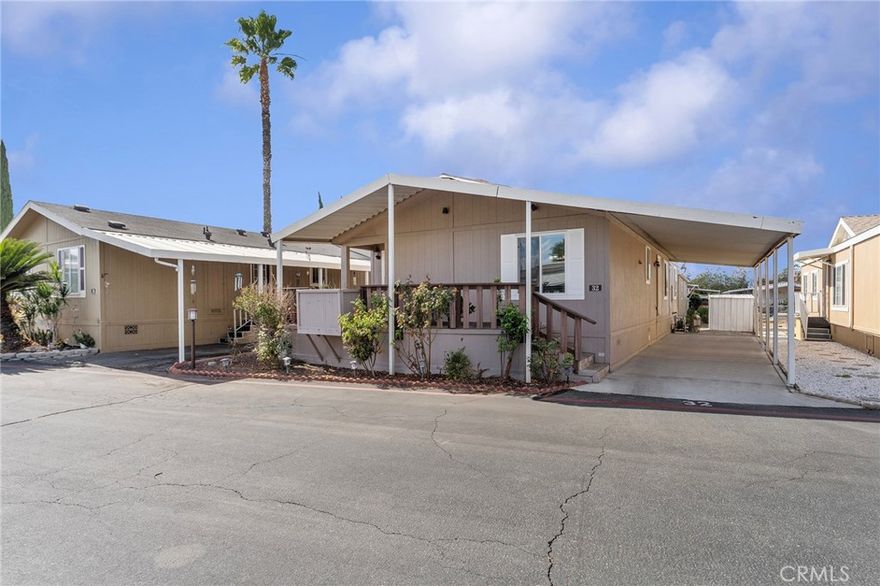 Welcome to Rancho Riverside! This beautiful, turn-key home exemplifies pride of ownership. The open and spacious floor plan features wood flooring in the living area, kitchen, and dining room. The updated kitchen includes ceramic countertops and a large built-in pantry. High-quality carpet adds comfort to the living area and all three bedrooms. Dual-pane windows with custom blinds provide energy efficiency throughout.
Both bathrooms are full and have been tastefully updated with shower/tub combinations. The home also offers a convenient indoor laundry room. Enjoy relaxing evenings on the tiled front porch with custom railing.
Located in a safely gated community, Rancho Riverside offers excellent amenities including a pool, spa, basketball court, billiard room, fitness center, and laundry facilities. Conveniently situated within walking distance of numerous stores and restaurants, this home also offers one of the lowest space rents in Riverside.
Don’t miss this exceptional opportunity to own a move-in ready home in one of the area’s most desirable communities!