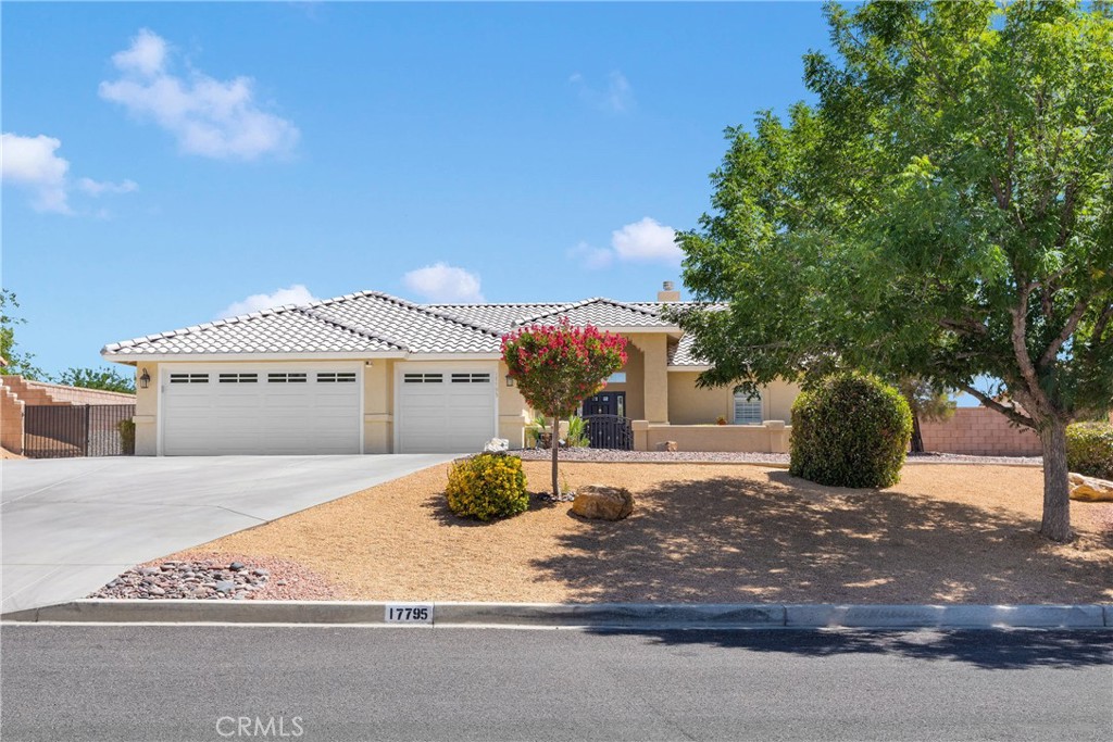 Stunning Upgraded Home in Apple Valley!
Welcome to 17795 Branding Iron Rd, a beautifully updated single-family home nestled in the heart of Apple Valley, CA. Perfectly situated on a spacious 20,000 sq. ft. lot, this exquisite 3-bedroom, 2-bathroom residence offers 2,610 sq. ft. of thoughtfully designed living space, ideal for growing families.
Enjoy the open floor plan of this home. Every room in this home has been meticulously upgraded with high-end finishes and modern touches. Step inside to find new flooring, elegant plantation shutters and 12’ high ceilings. Enjoy cozy evenings by one of the two fireplaces or entertain guests in the expansive living areas enhanced by crown molding, upgraded baseboards, and stylish ceiling fans.
This kitchen is a chef’s dream with double ovens, cooktop, dishwasher, travertine backsplash, under-cabinet lighting, a beautiful custom-built island and granite countertops.
The master suite is a luxurious retreat, complete with a dedicated A/C unit, his-and-hers walk-in closets, dual vanities, granite counters and a spa-like atmosphere.
This home is as functional as it is beautiful, featuring a split floor plan, a formal dining room, a separate laundry room with upper and lower cabinets with a large folding counter, and a 3-car garage that comes with insulated doors, quiet openers, and a full workshop equipped with built-in cabinets and workbench.
Outside, the beautifully landscaped front and backyard are designed for both relaxation and entertainment. Enjoy morning coffee in the large front courtyard or host gatherings under the covered back patio. With RV parking, a dump station, electric hookups, and space for a boat, this home truly has it all. Two spacious storage sheds provide additional room for tools, toys, or hobby gear.
The tile roof was recently removed and new roofing paper and batting installed.
Located just a few miles from the I15 Freeway makes this the perfect commuter home. Don’t miss the opportunity to own this exceptional, move-in ready home in one of Apple Valley’s most desirable neighborhoods. Schedule your private tour today and fall in love with everything this home has to offer!