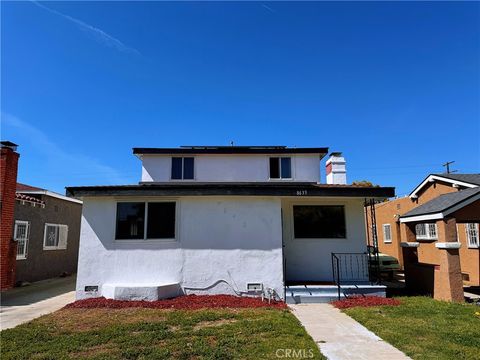 Photo of 8633 Cimarron Street, Los Angeles, CA 90047 (MLS # OC26050677)