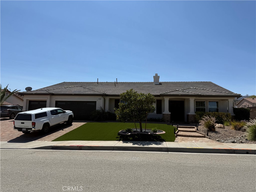 Westside WINNER! This IS IT!! Huge Single Story in New West Tract! Perfectly Situated on Prime Corner Lot! 4 BR + Office/Den + 3 Baths. 3344 SF! Built in 2003. Tile Roof. Stucco Exterior. Wood Trim. 3-Car Garage. Roll-up Doors-Windows. Outstanding Curb Appeal! ''B'' Elevation with Brick Accents! Attractive Paver System in Driveway, Patio, and Walkways! Exterior Lighting. Covered Front Porch. Faux Shutters. EZ Maintenance! Artificial Turf. Front Xeroscape with Auto Drip System. Rain Gutters. Gated RV Access with Storage Sheds. Double 8-Foot Metal Entry Doors! Extensive 16 X 16 Tile and Hickory Engineered Hardwood Floors! Bullnose Drywall. 10-Foot Ceilings! Lots of Recessed Lighting! LR/DA Combo. 3-Inch Wood Shutters. Gorgeous Island Kitchen with Raised Breakfast Bar! E-Grade Granite Counters and Backsplash. Medium Maple Cabinets. Pull-out Drawers. Pot Rack. Stainless Appliances. 5-Burner Counter Top Range. Electric Oven. Stainless Sink. Frig and Bar Stools Stay! Large Breakfast Nook. Spacious Family Room with Fireplace and Custom Built-in Entertainment Center! Decora Paddles. Digital Thermostat. 2-Zone Air-Heat! Indoor Laundry. Washer and Dryer Stay! Alarm Pad. 6-Panel Doors. Tankless Water Heater. Deluxe Primary Suite Features Amazing Walk-in Closets and Totally Upgraded Walk-in Double Shower! Fancy Counter with Vessel Sinks! Remote Blinds. Heated Towel Racks and Floor! Big Bedrooms! Finished Garage with Cabinets, Overhead Storage, and 2 GDO's. 2nd Frig Stays. Giant Well-Lit Backyard also has Artificial Turf, Paver Patio and Walkways. Big Alumawood Patio Cover! Ceiling Fans. BBQ Stays! Patio Furniture and Potted Plants! Block Walls. Over 15,000 SF Lot! PPA Solar is only $251/Month! THIS One is Love at First Sight!!