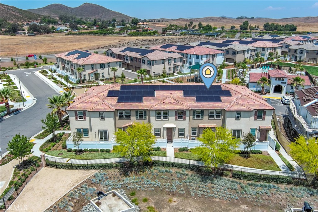 MODEl HOME! Fast move in OK! Welcome to this charming two-story townhome in the desirable Sevilla community in Winchester, California! This VA-approved home offers a fast close and features a lovely front courtyard. Inside, you'll find an open floor plan with a modern kitchen that includes granite countertops and an island. The downstairs also has a convenient half bath and a two-car garage. Upstairs, you'll find a primary owner's suite along with two additional bedrooms. The home is just steps away from a pool and spa, and the community offers a recreation center, barbecue area, outdoor dining, and a playground. Plus, it's conveniently located near Temecula wineries and the Promenade Mall for all your shopping needs!