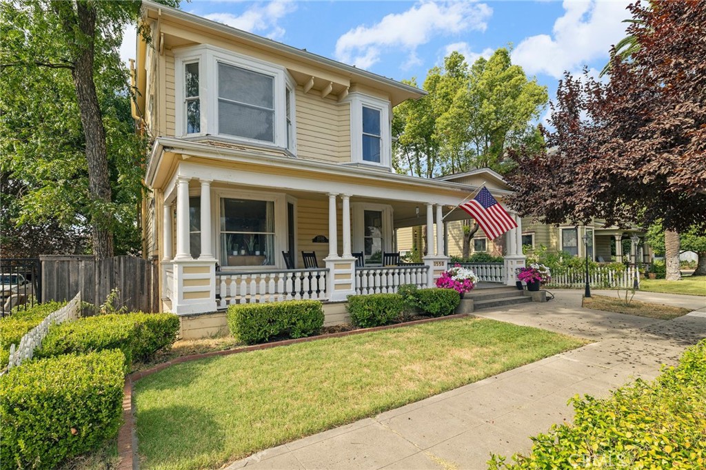 Vintage homes aren’t just houses—they’re a way of life. If you love old-world charm and character, this one’s for you. This unique Craftsman-style home, built in 1905, stands out in a neighborhood full of other beautiful, historic properties. From the street, the home has real curb appeal with its wraparound sun porch, classic railing, and charming front details. Step through the solid front door and you’re greeted by an antique chandelier and a grand staircase that immediately give the feeling this home was built for someone important. With nearly 2,900 square feet, there’s tons of space and vintage details throughout—tall ceilings, original hardwood floors, beautiful moldings, and custom window casings. Natural light fills the home through big bay windows. The living room and family room are open and connected by an oversized archway, with built-in shelves and a cozy fireplace adding even more charm.
Located in a desirable, tree-lined neighborhood close to the Feather River, and the historic Downtown Oroville shopping district, this home blends timeless character with an unbeatable location. A little TLC will go a long way in making this timeless house truly your own.