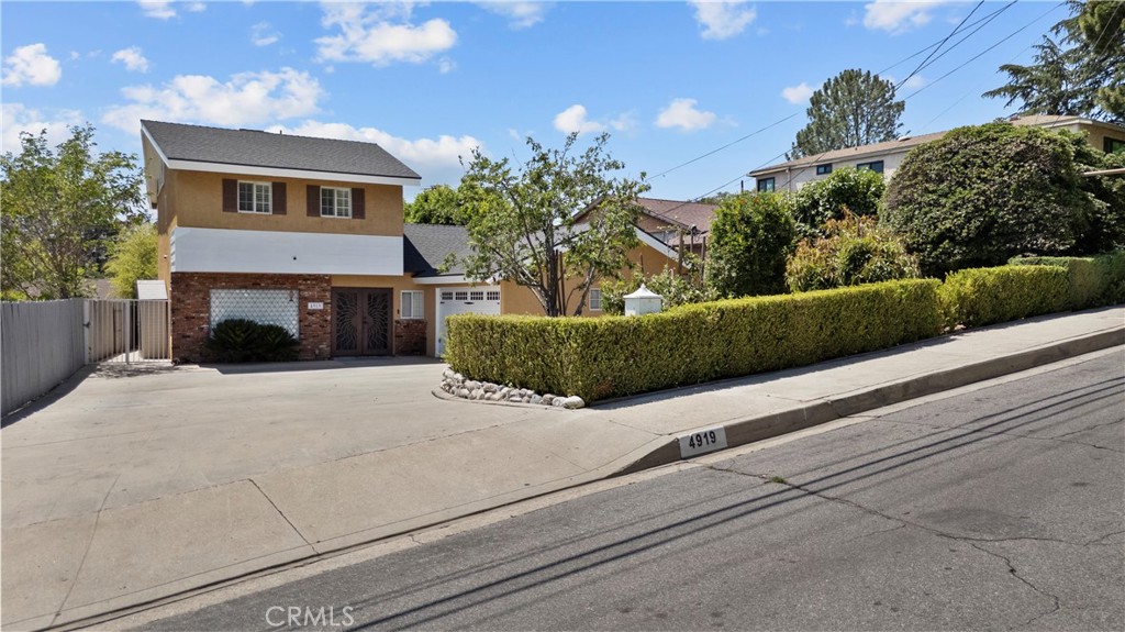 Welcome to this beautifully updated 3-bedroom, 2-bathroom two-story home located above Foothill Blvd in the highly sought-after La Crescenta community. The functional layout includes one bedroom on the main floor—perfect for guests or a home office—and two additional bedrooms upstairs connected by a Jack-and-Jill bathroom, offering both convenience and privacy. Inside, you’ll find a updated kitchen and bathrooms featuring modern, high-quality finishes throughout. Step outside to an entertainer’s dream backyard complete with a newly installed Pebble Tec beach-entry pool and a relaxing spa. Enjoy year-round outdoor living under the spacious covered patio, equipped with a fully functional outdoor kitchen, surround sound speakers, ceiling fans, and outdoor blinds—perfect for hosting or unwinding in style. Located in a peaceful neighborhood above Foothill Blvd, this home offers access to top-rated schools, scenic trails, and the charm of the Crescenta Valley lifestyle. Don’t miss this rare opportunity to own a true entertainer’s paradise in one of La Crescenta’s most desirable pockets.