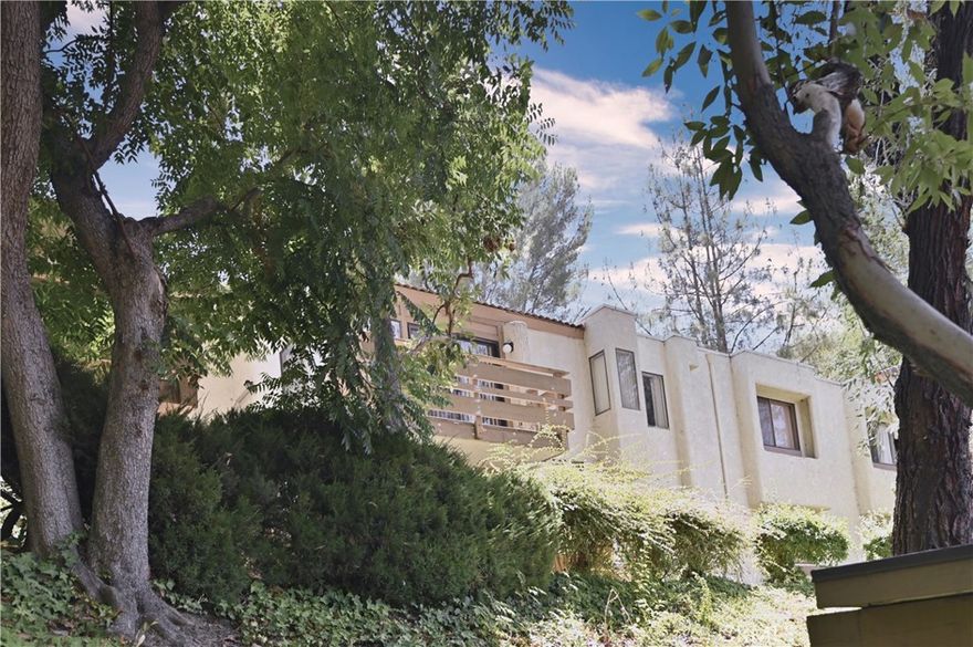 CITY LIGHT VIEW!  Gated community with 24/7 security. features vaulted ceilings, natural light that pours in throughout the day. Enjoy peaceful mornings or relaxing evenings on your private balcony, surrounded by forest-like trees for a serene retreat, includes an in-unit laundry room and comes with two parking spaces conveniently located near the unit. The community offers resort-style amenities including multiple pools, tennis courts, and a charming clubhouse with billiards, full kitchen, game tables and a cozy fireplace. prime location of Diamond bar, just minutes from major freeways, Cal Poly Pomona, Mt. SAC College, golf courses, hiking trails, parks, and a variety of shopping, dining and grocery.