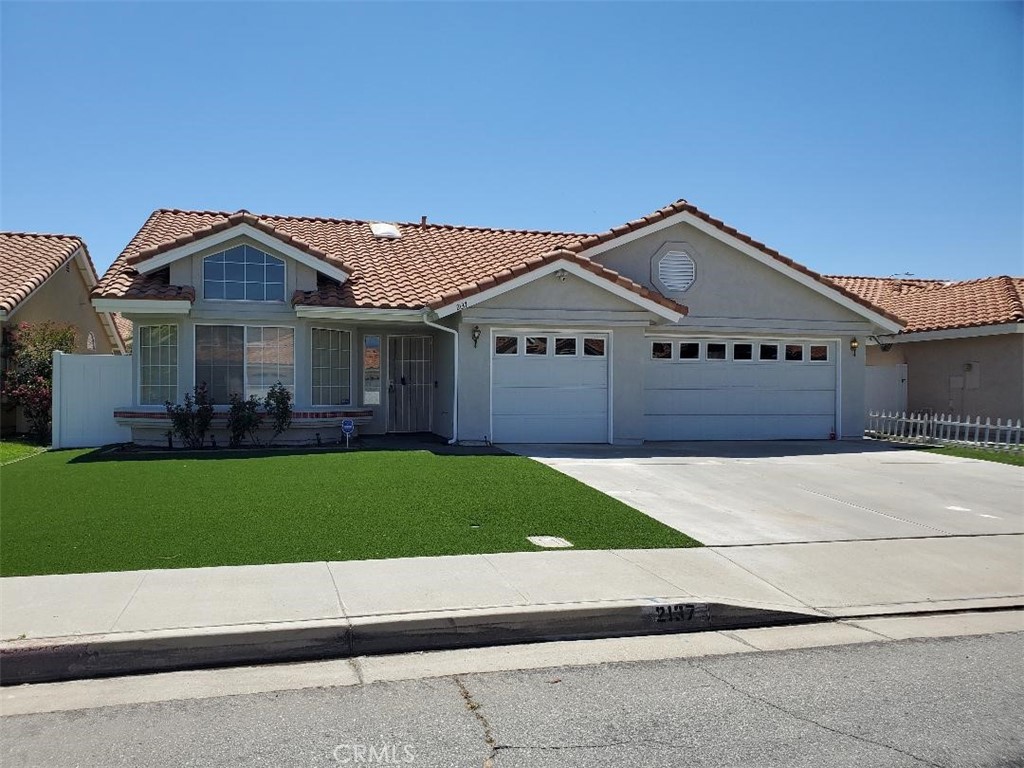 Beautiful Hemet home! Features include 4 bedrooms, 2 baths, with 1971 sq ft of living space. Additional features include an insulated enclosed patio, central air and heat, fireplace, fresh interior paint, large primary bedroom with bathroom, inside laundry room! New exterior paint, 3 car attached garage, low maintenance landscaping. Close to schools, shopping, and parks!