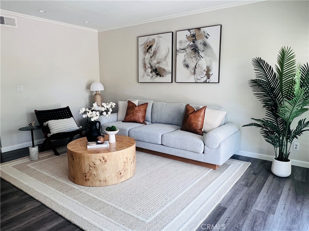 Welcome to 144 W Yale Loop, an impeccably updated home nestled in the heart of Irvine’s highly desirable Woodbridge community. This spacious 3-bedroom, 2.5-bath residence offers a thoughtfully designed floor plan with two inviting living areas, perfect for both relaxing evenings and lively gatherings. The newly remodeled kitchen is a true showpiece, featuring crisp white shaker cabinets, quartz countertops, stainless steel appliances, designer hardware, and an open layout that flows seamlessly into the living spaces. The primary suite is a serene retreat, complete with a spacious layout, abundant natural light, and a beautifully appointed en-suite bath. Two additional bedrooms provide flexibility for family, guests, or a home office. Stylish finishes, new upgrades, and abundant windows create a bright, airy atmosphere throughout the home. Step outside to enjoy a private patio, ideal for morning coffee or weekend barbecues. As part of the Woodbridge community, you’ll have exclusive access to resort-style amenities including lakes with sandy lagoons, multiple swimming pools, tennis courts, parks, and miles of walking and biking trails. Located within the award-winning Irvine Unified School District, this home is also just minutes from shopping, dining, and easy freeway access. Move-in ready and designed for modern living, it is the perfect blend of comfort, style, and convenience.
