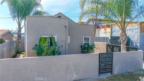 Photo of 1712 E 57th St, Los Angeles, CA 90058 (MLS # DW26043659)