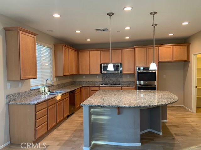 Gorgeous 3 bed, 2 bath, single story home located in the highly desirable Rosetta Canyon neighborhood. Beautiful open flooring plan with spacious living, dining & open kitchen concept. Huge power savings with Energy efficient Solar panels & whole house fan. Private, and quiet end of street location. Large primary bedroom suite with amazing bathroom and walk-in closet. Upgraded throughout with granite kitchen counter tops. Upgraded tile plank flooring. Carpeted bedrooms. Beautiful, Remodeled guest bathroom. Bright and clean inside & out. Light and Spacious. Romantic living & dining areas. Comfortable Master suite has walk-in closet. In house Laundry room. Large kitchen pantry. Private rear yard with open patio. Rosetta Canyon Community park with tennis & basketball Courts, baseball field, playground, and garden. Close distance to schools, Sports facilities, shopping, and easy freeway access. Available for a 8/15/2025 move in.