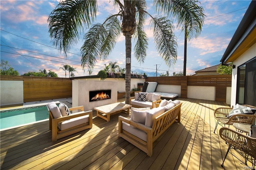 Beautiful brand-new RESORT style house on the border of Tarzana. From the moment you step into this 3 bed 2 bath home with additional permitted 1+1 GUEST HOUSE/ADU you will never want to leave. The owner is a contractor and no expense was spared in designing this house with all high end materials and attention to detail for his family. Wood floors and an open layout provide a warm feel that is carried throughout the house. The kitchen includes a 6 burner Jenn-Air range, high end appliances and custom cabinetry. The formal dining area and living area open up to the backyard creating a harmonious indoor-outdoor flow. The backyard is truly an oasis offering you the option to lounge around the pool or take a dip in the jacuzzi each night. The large patio is ideal for entertaining around the outdoor fireplace or grilling up a meal on the BBQ. The grand scale master en-suite and bathroom include a separate large glass custom walk-in shower and spa-style bath retreat with a large soaking tub. The bedrooms and bathrooms offer a heightened level of comfort and are aesthetically pleasing with custom cabinets, vanities, and built-in walk-in closet. The guest house, which is a separate address and entrance for potential additional income, includes a full kitchen and bathroom. This amazing house is just under 1700 sqft for both properties. Located within walking distance to Yogurtland, Starbucks, Vons, restaurants, and a variety of other stores this property will not last!!