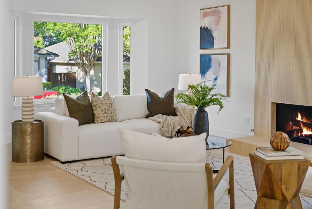 Beautifully renovated and flooded with natural light, this 3BD/2BA Walnut Creek home blends modern style with everyday comfort. Every detail has been refreshed, including new windows, wide-plank waterproof flooring, designer lighting, and fresh paint inside and out. The reimagined kitchen boasts new cabinetry, quartz countertops, and brand-new appliances, opening to airy living space and dining area designed for gathering. The primary suite is a true sanctuary with a fluted porcelain-tiled shower, deep soaking tub, and stylish dual vanity. Two additional bedrooms and a renovated hall bath provide flexibility for family, guests, or office needs. At the center of the home, an open-air atrium offers a private escape to relax and savor California living. Fresh backyard landscaping, HOA-maintained front yards, and a community pool make this home easy to enjoy. All this, just minutes from downtown Walnut Creek, major freeways, BART, top medical facilities, shopping, parks, scenic trails, and within a highly desirable school district. Modern updates, effortless living, and a quiet court location make this a must-see!