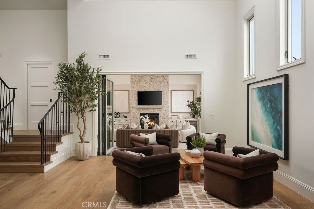 There’s a certain magic to this Corona del Mar hideaway. Tucked into the Village, it’s a home that feels both elevated and effortless, modern yet warmly inviting. Two private bedrooms give you space to recharge, while the soaring ceilings and open design bring in a wash of sunlight that shifts beautifully throughout the day. Fresh finishes and a modern color palette set the tone as clean, stylish, and relaxed. The rooftop deck is the crown jewel, offering sweeping views, framed by the iconic Goldenrod palms. It’s a place to sip wine at sunset, gather with friends, or simply breathe in the ocean air. Every detail has been reimagined with care, creating a home that’s as practical as it is polished and just moments from beaches, local cafés, boutiques, and everything that makes CdM so loved.