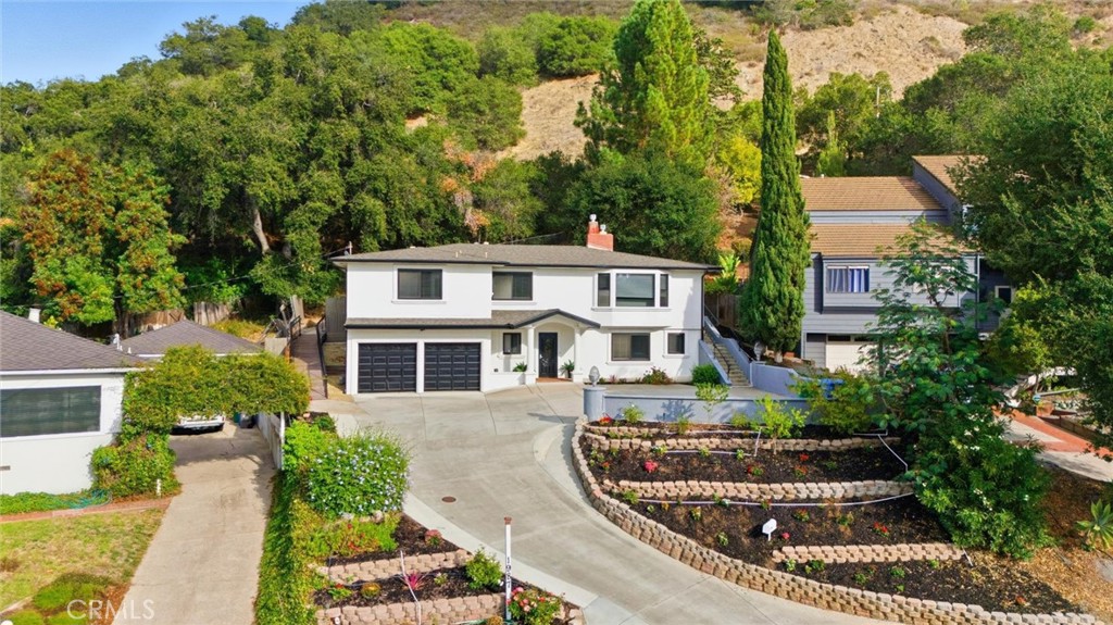 Located in the highly coveted San Luis Drive neighborhood, this inviting 4-bedroom, 3-bath home offers a wonderful blend of comfort, flexibility, and natural beauty. The versatile fourth bedroom can easily function as a home office, guest suite, or creative space, adapting perfectly to your lifestyle needs.
The kitchen and dining area open seamlessly to a covered patio, ideal for enjoying San Luis Obispo's ideal year-round weather. Mature oak trees provide shade and privacy, while the picturesque mountain views create a tranquil backdrop.
Nestled on a quiet street just minutes from downtown San Luis Obispo, schools, and local trails, this home captures the essence of classic Central Coast living—combining a prime location with timeless appeal.