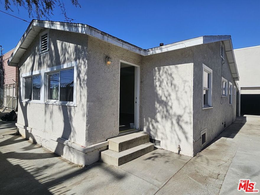 Tremendous Live/Work opportunity in heart of Hyde Park, adjacent to the 5.5 mile Rail-to-Rail path. A $143 Million project investment into the community, which triggered favorable and flexible zoning with more density allowed. This offering features a wood-frame stucco house on a raised foundation situated on a 4,805 square foot lot. This single-family house is approximately 1,085 square feet with two bedrooms and one full bathroom, with a bonus room for a potentially a third bedroom. The house features a spacious living with a semi open layout to a large kitchen area.  It has a new 200 AMP electrical panel, newer double pane windows, roof, plumbing, upgraded plumbing, kitchen cabinets, furnace, water heater, washer/dryer hook ups, and driveway which could park up to 3 vehicles. The property is completely fenced and gated, it also includes a yard behind the garage. There is a massive garage/warehouse component attached the single-family home.  This rear garage/warehouse building has generous ceiling height it's approximately 1,680 square foot, with 16-foot ceilings and 8'5" X 8'5" ground-level roll up door plus a standard door for ingress/egress. This is rare opportunity to acquire an ideal live/work building with highly leverage financing. A Buyer could purchase these live/work structures with a first time Buyer residential loan, with fixed financing and a low-down payment looking at this opportunity from a residential perspective.  On the other hand, the rear structure is more than 51% of the rentable square footage. SBA loan is a potential loan opportunity to purchase this building with 10% down payment, if a Buyer can demonstrate they will be using the rear building for this business.  This is perfect for any light industrial user such as a woodworker, auto related use or artistic with an open canvass ready to customize to suit their business needs.